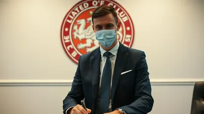 Llanelli AFC signs Josef Hopkins, a 35-year-old Welsh central midfielder, to strengthen the squad for the upcoming season